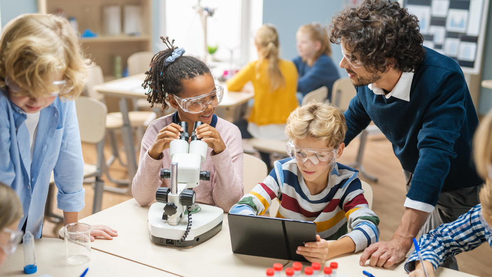 Teamwork in school science laboratory