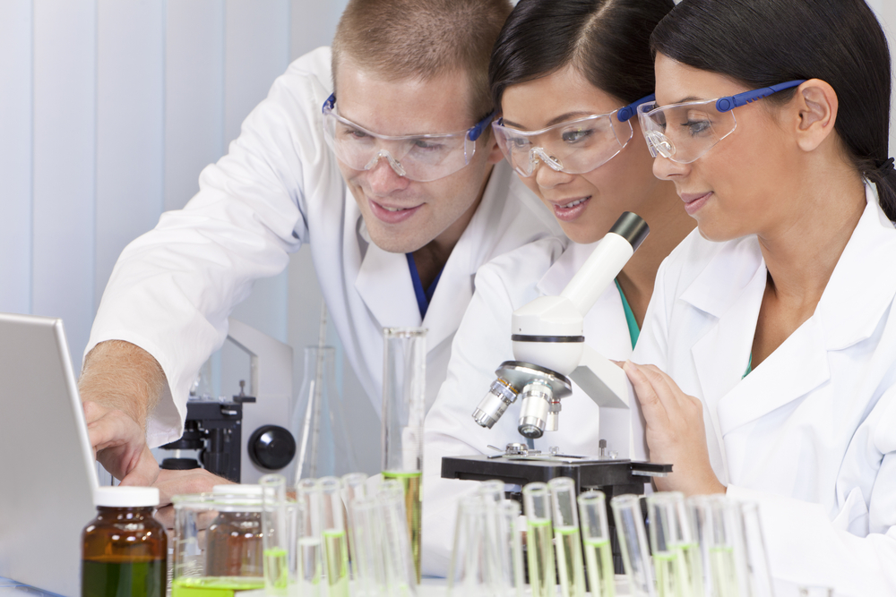 Lab equipment - student using microscope