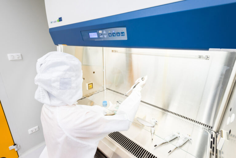 Fume Hood Safety Audit - Scientist using fume hood