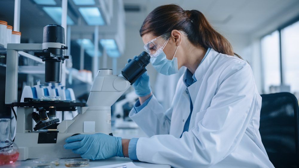Microbiologist Working in Modern Laboratory with Technological Equipment