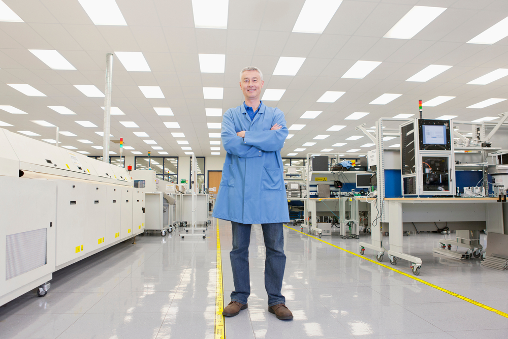 Engineer standing in a high tech electronic facility with anti-static lab flooring